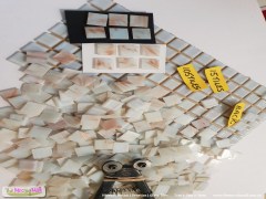 Mosaic glass vitreous mosaic tiles, gold, white streaked.